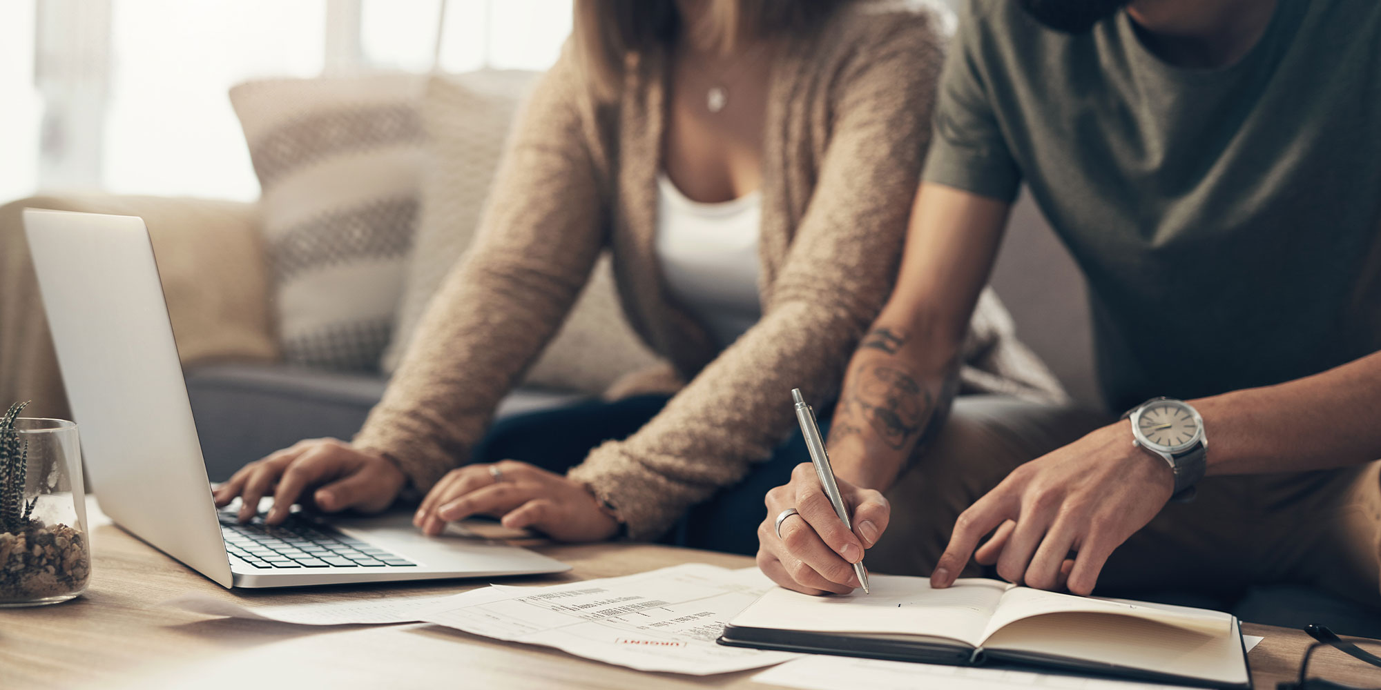 couple going over finances within in their home