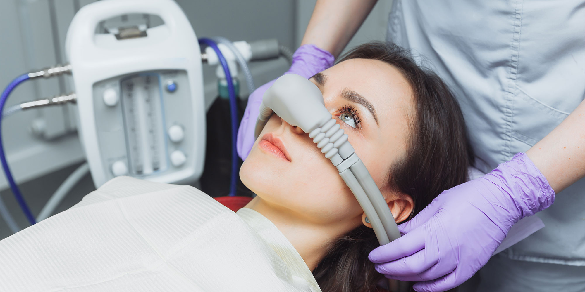 female patient going under sedation for dental treatment